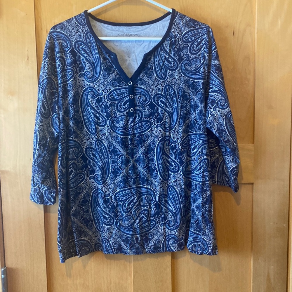 A navy V-neck shirt